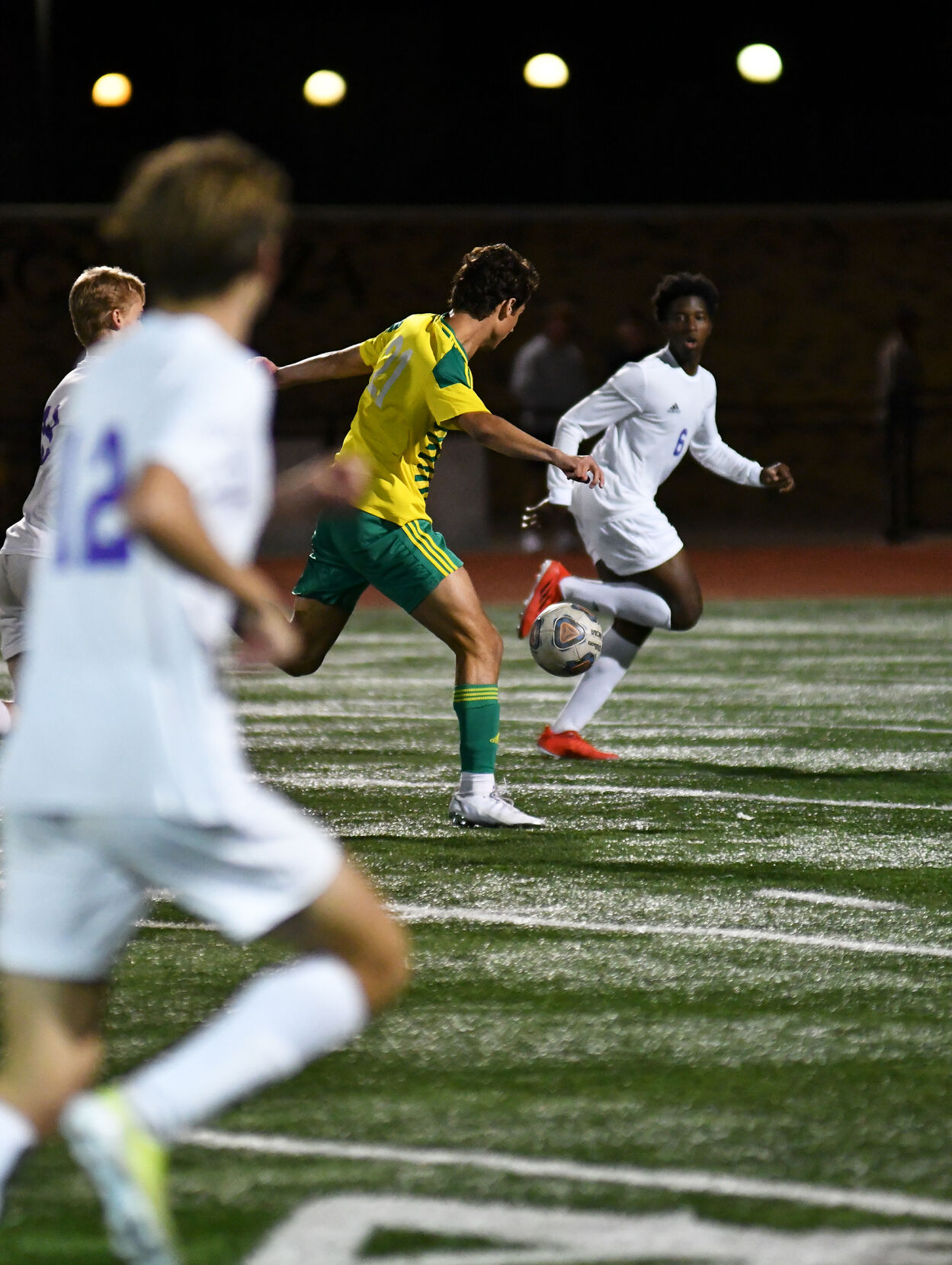 Rock Bridge senior Andrew Copeland runs the ball down